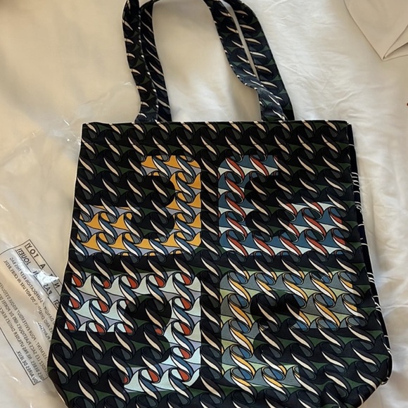 Handbags - COPY - BRAND NEW TORY BURCH CURLY RIBBON $60
Size: 13 1/2" H x 12 1/2" L Tory B…